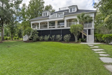 This Lowcountry Estate sits on a park-like private lot with