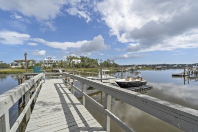 This Lowcountry Estate sits on a park-like private lot with