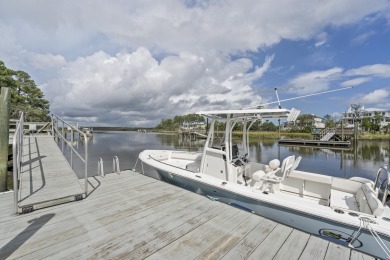 This Lowcountry Estate sits on a park-like private lot with