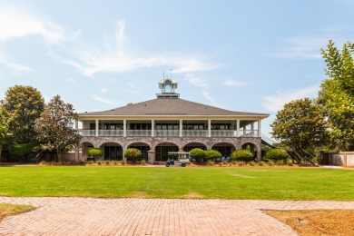 This Lowcountry Estate sits on a park-like private lot with