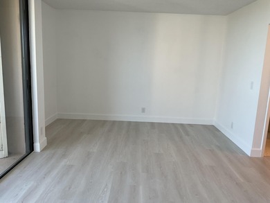 Make this 2br 2bath unit your forever home.  It has new flooring