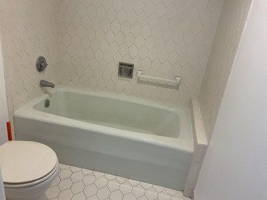 Make this 2br 2bath unit your forever home.  It has new flooring