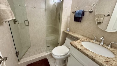 Premier 1 bedroom unit a stunning open water and pool view off