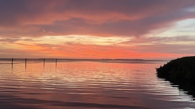 Premier 1 bedroom unit a stunning open water and pool view off