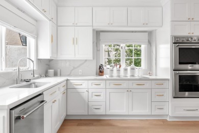 Step into refined luxury at this completely remodeled townhome