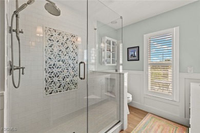 This raised 3-bedroom, 2-bath lake-view home in the popular Gulf