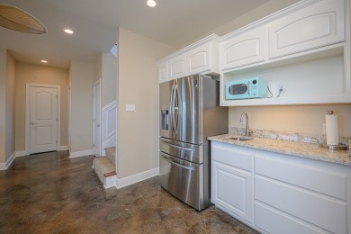 With a recent $200,000 price reduction, this home is now priced