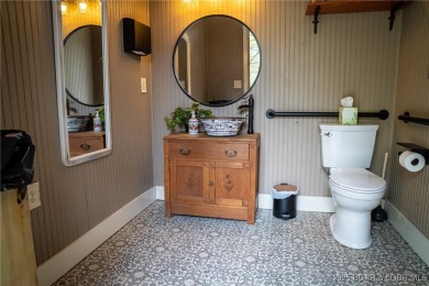 Luxury Meets Rustic Charm on 185 Acres! This turnkey estate