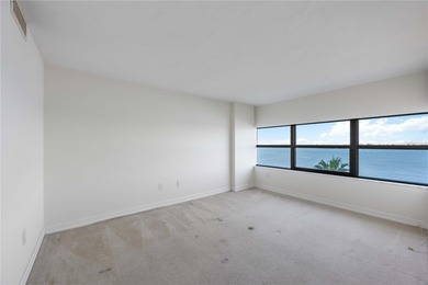 DIRECT BAYFRONT! Rare Opportunity for the buyer that understands