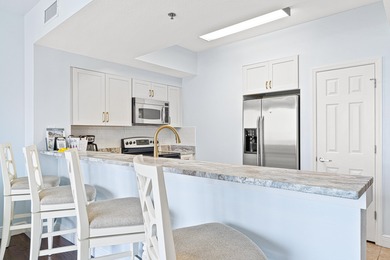 Seize the opportunity to own this updated 11th-floor unit with