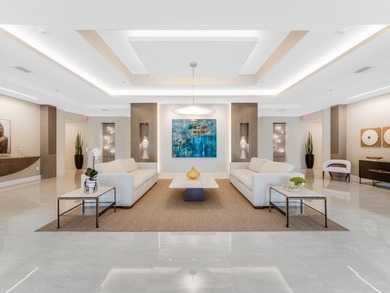 Arrive by private elevator into this 2BR + den, 3.5BA residence