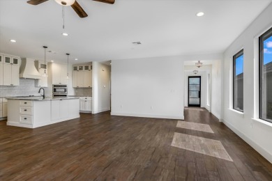 Welcome to 319 Parallel Circle. This like-new home was built in