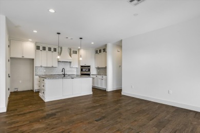 Welcome to 319 Parallel Circle. This like-new home was built in