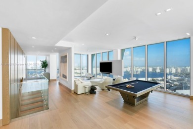 Welcome to Sky Villa 5105 at Jade Signature, a rare two-story