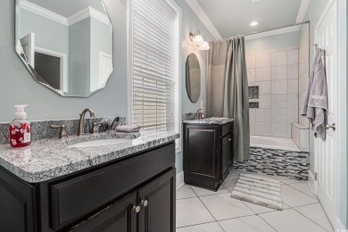 This beautifully designed custom 5-bedroom, 5.5-bathroom home