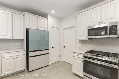 NEWLY RENOVATED BEACHFRONT CONDO WITH STUNNING WATER VIEWS! This