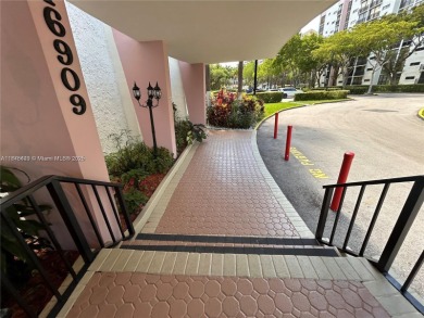 GATED 1 BDR 1.5 BATH TILED UNIT WITH WATER VIEW. 1 BLOCK TO