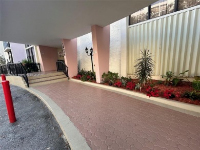 GATED 1 BDR 1.5 BATH TILED UNIT WITH WATER VIEW. 1 BLOCK TO