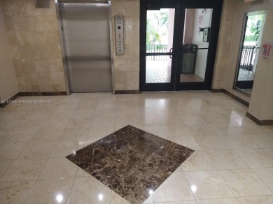 GATED 1 BDR 1.5 BATH TILED UNIT WITH WATER VIEW. 1 BLOCK TO