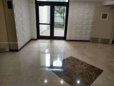 GATED 1 BDR 1.5 BATH TILED UNIT WITH WATER VIEW. 1 BLOCK TO