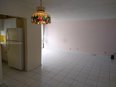 GATED 1 BDR 1.5 BATH TILED UNIT WITH WATER VIEW. 1 BLOCK TO