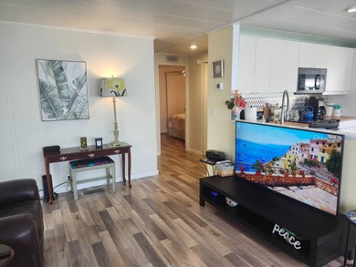 Made you look! This spectacular 2/2 open concept is ready for