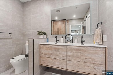 Discover this oversized 2-bedroom, 2-bath residence boasting