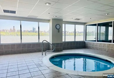 Discover this oversized 2-bedroom, 2-bath residence boasting