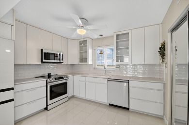 This WATERFRONT, 7th Floor CORNER Unit is Paradise!  Newly