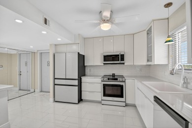 This WATERFRONT, 7th Floor CORNER Unit is Paradise!  Newly