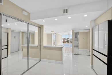 This WATERFRONT, 7th Floor CORNER Unit is Paradise!  Newly