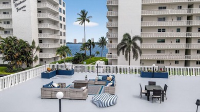 This WATERFRONT, 7th Floor CORNER Unit is Paradise!  Newly