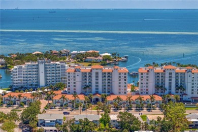 Luxury meets lifestyle in this top-floor Water Club Snell Isle