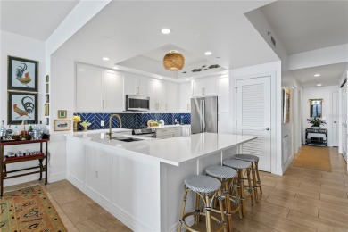 Luxury meets lifestyle in this top-floor Water Club Snell Isle