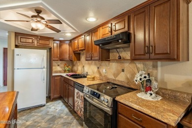 Welcome to the gated community of Queen's Bay Resort &