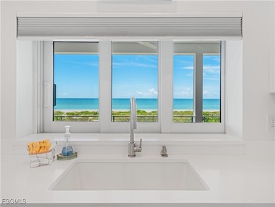 Welcome to a stunning coastal-modern beachfront estate on