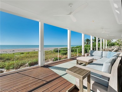 Welcome to a stunning coastal-modern beachfront estate on