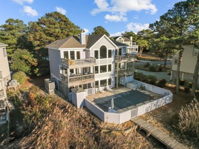 Welcome to 876 Drifting Sands Drive, where the beauty of coastal