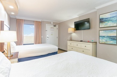 Experience oceanfront living in this beautifully upgraded