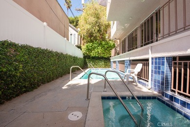 Attention investors and visionaries! This vacant condo needs