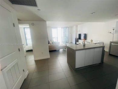 Spacious 1-bed, 1-bath condo furnished (excl. 2 paintings).

