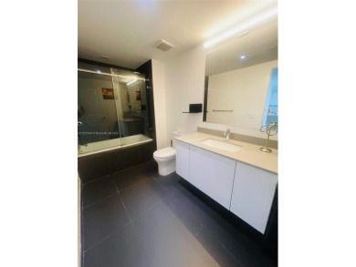 Spacious 1-bed, 1-bath condo furnished (excl. 2 paintings).

