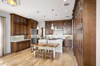 Experience waterfront luxury in this Riverbend original model