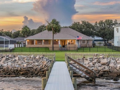 Beautiful waterfront home with 97 ft shoreline on a half-acre