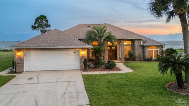 Beautiful waterfront home with 97 ft shoreline on a half-acre