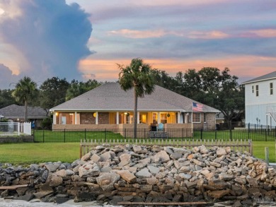 Beautiful waterfront home with 97 ft shoreline on a half-acre