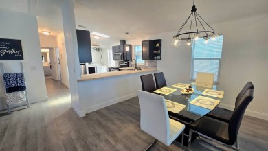 TAKE A LOOK! Step into modern comfort and convenience in this