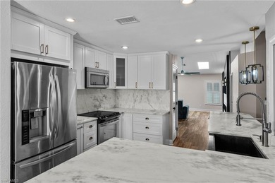 SWIM SPA - ENCLOSED LANAI - REMODELED HOME! This beautifully