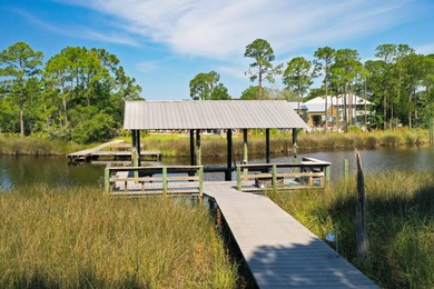 Welcome to your waterfront sanctuary at 95 Bluebell Cir, Santa