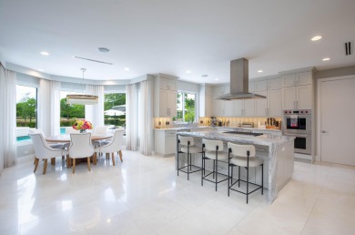 Timeless elegance in Palm Beach Polo & Country Club! This 6BD/6